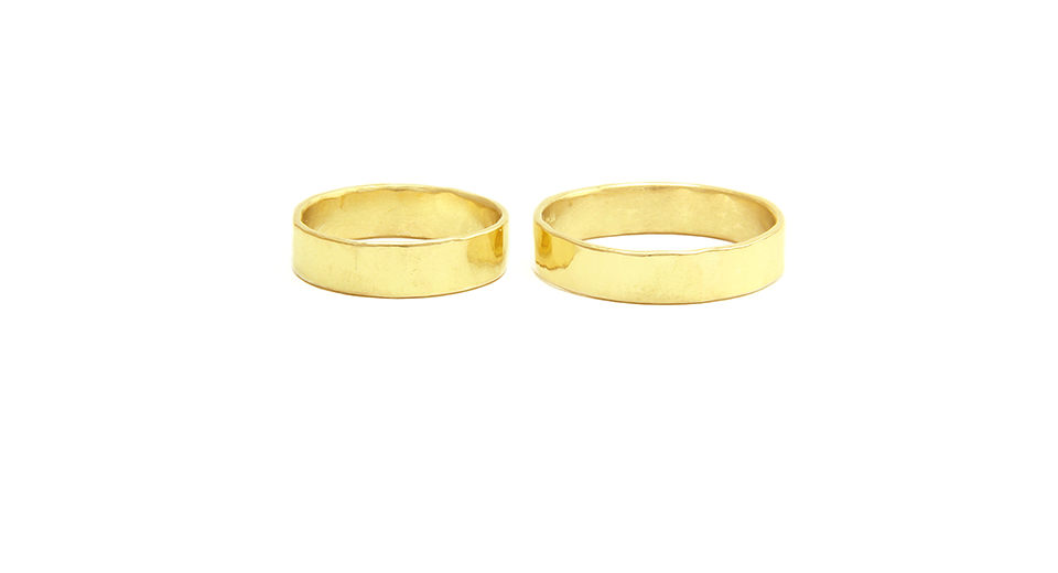 Wide-hand-forged-18ct-gold-wedding-rings